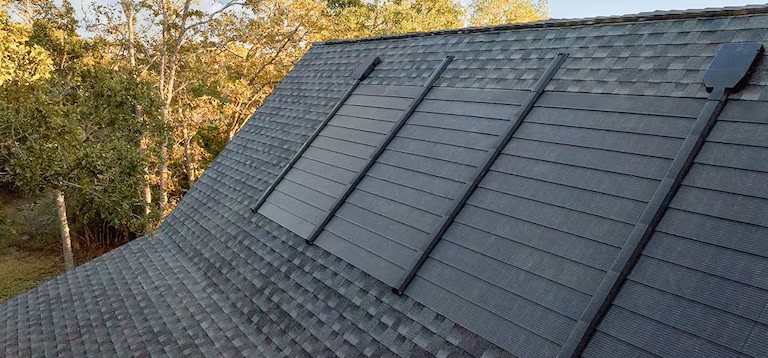 Close-up of GAF Timberline Solar shingles integrated into roof