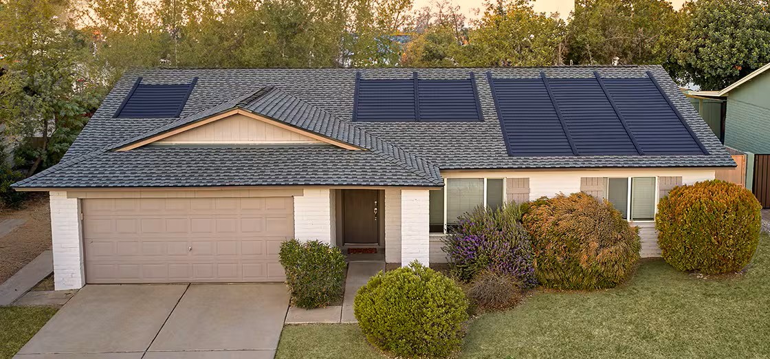Single-family home with GAF Timberline Solar shingles installed flush in the roof
